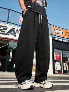 Pantalon de sport ample pour hommes, pantalon de sport incurvé toutes saisons, doux et confortable, convient aux sports et à l'usage quotidien - Noir - Voir 1