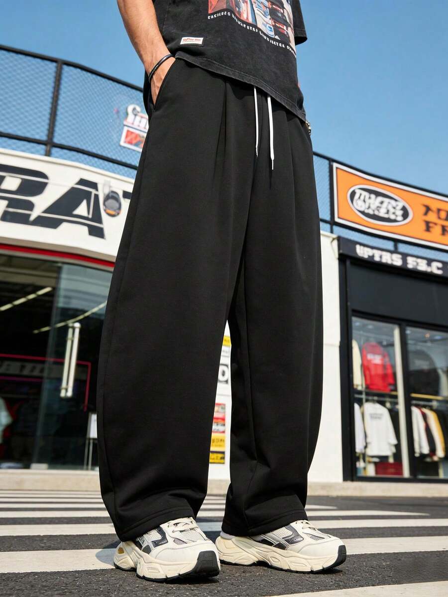 Pantalon de sport ample pour hommes, pantalon de sport incurvé toutes saisons, doux et confortable, convient aux sports et à l'usage quotidien - Noir - Voir 1