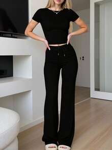 Ensemble sport décontracté d'été style Y2K pour petites femmes, comprenant un t-shirt à col rond manches courtes de couleur unie et un pantalon slim à jambes droites noir élégant - Noir - Voir 9