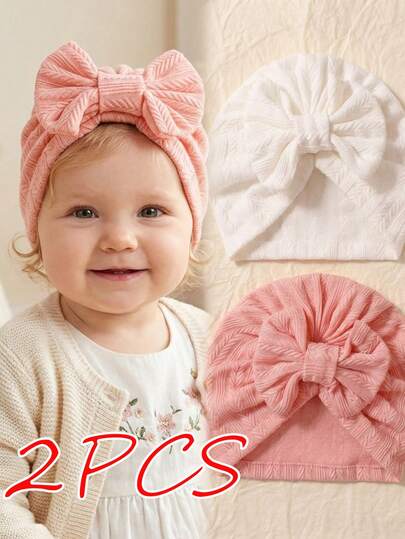 Bộ 2 mũ len màu hồng và trắng cho bé, có nơ trang trí, mũ mềm cho trẻ sơ sinh, quà tặng lý tưởng, phù hợp sử dụng hàng ngày.