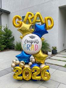 43件套2026毕业派对装饰，包括16英寸金色“GRAD2026”横幅铝箔气球、18英寸金/蓝色星星气球和10英寸金/蓝色金属乳胶气球，适用于2026届毕业典礼及2026届毕业生装饰。 - 查看 7