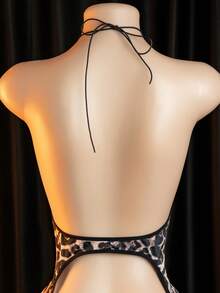 Bộ jumpsuit hở lưng, cổ yếm, hở đáy in họa tiết da báo gợi cảm - màu đen - Xem 5