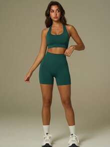 UONNOU Bộ 2 món, kiểu dáng mùa xuân hè, đồ thể thao nữ: Áo hai dây siêu ngắn cổ yếm, hở lưng gợi cảm, tôn dáng; Quần short cạp cao ôm sát, nâng hông, định hình vòng ba. Bộ đồ thể thao, tập luyện và định hình vóc dáng, phù hợp cho yoga, chạy bộ, tập gym và mặc thường ngày. - màu xanh lá - Xem 10