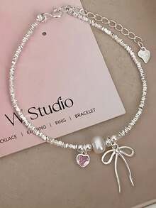 Vòng tay bạc Sterling hình trái tim màu hồng, nơ tình yêu, ngọc trai bạc vỡ, thiết kế đơn giản kiểu Nhật Bản và Hàn Quốc. - Vòng tay nơ bạc - Xem 7