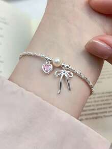 Vòng tay bạc Sterling hình trái tim màu hồng, nơ tình yêu, ngọc trai bạc vỡ, thiết kế đơn giản kiểu Nhật Bản và Hàn Quốc. - Vòng tay nơ bạc - Xem 9