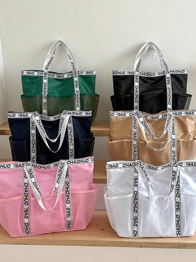 女士防水大容量沙滩包，轻便实用，是度假必备，可装拖鞋、泳衣等。男女通用运动休闲手提包，尼龙材质，防水层设计，适合户外、度假、游泳、健身、购物等场合。