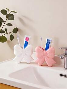 1件/2件装蝴蝶结形牙刷牙膏收纳架，浴室水槽置物架，母亲节礼物。 - 站立蝴蝶結 - 查看 6