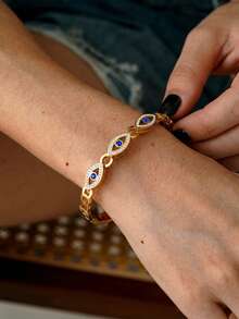 RAYQUEEN 1 pieza Brazalete chapado en oro de 18K con rhinestones SENLANSP, elegante y urbano con diseño de ojo malvado - 1 pieza Brazalete de acero inoxidable chapado en oro de 18K con rhinestones para mujer, ideal para bodas, fiestas y regalos - pulsera - Ver 2