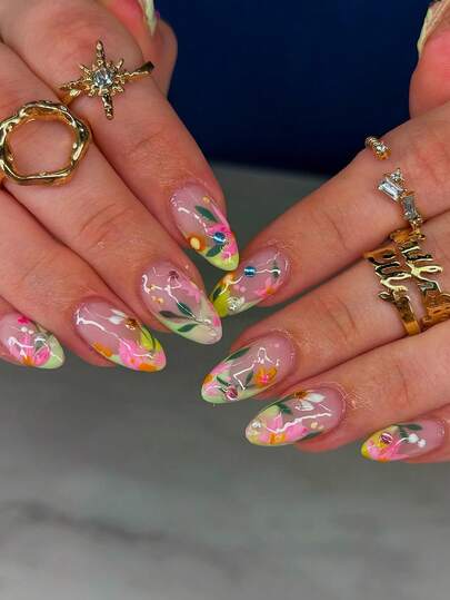 Bộ quà tặng 24 móng tay giả hình hạnh nhân bằng acrylic, bộ sưu tập "Vườn Xuân": Đầu móng kiểu Pháp màu xanh lá cây nhạt và hoa ba cánh màu hồng nhạt. Thiết kế theo phong cách "Ins-Style" với vẻ đẹp như tranh sơn dầu - tươi mới, dịu nhẹ và tràn đầy sức sống. Có thể tháo rời và tái sử dụng; hoàn hảo cho các bữa tiệc và những buổi đi chơi. Móng giả bao gồm miếng dán dạng gel (1 tờ) và dũa móng (1 cái).