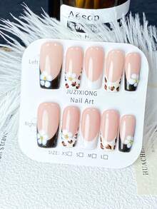 Bộ 10 miếng dán móng tay thủ công màu hồng nude họa tiết da báo và hoa trắng (XS/S/M/L): Nền hồng nude với họa tiết da báo màu nâu đậm, đầu móng kiểu Pháp màu trắng và trang trí hoa trắng 3D, phong cách trung tính ngọt ngào, bề mặt bóng mịn, phù hợp cho các hoạt động hàng ngày, các dịp xã giao nhẹ nhàng, có thể tái sử dụng. - Màu nâu Sô-cô-la - Xem 12