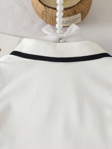 Conjunto de moda casual y lindo para niñas pequeñas, camisa de cuello acanalado + bordado de lazo, falda plisada de unicolor con lazo - Blanco - Ver 6
