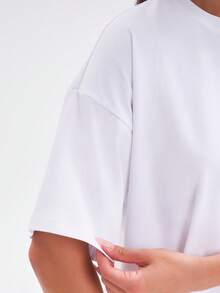 T-shirt femme uni, coupe oversize, épaules tombantes, col rond, manches courtes | 95 % coton, jersey Lycra, coupe décontractée | Haut basique ample idéal pour le streetwear, les moments de détente et le quotidien | Taille 42 | Couleur : Blanc - Blanc - Voir 6
