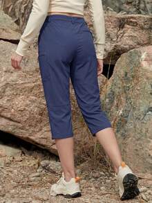 Cavva 女士七分防水裤，透气速干，轻便柔软，中腰设计，弹性裤脚，可调节裤脚开口，5个安全口袋，适合徒步、露营和休闲穿着。 - 藏蓝色 - 查看 4