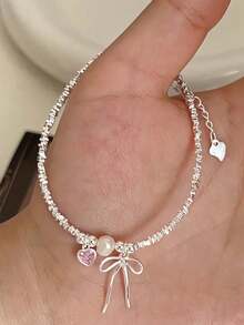 Vòng tay bạc Sterling hình trái tim màu hồng, nơ tình yêu, ngọc trai bạc vỡ, thiết kế đơn giản kiểu Nhật Bản và Hàn Quốc. - Vòng tay nơ bạc - Xem 5