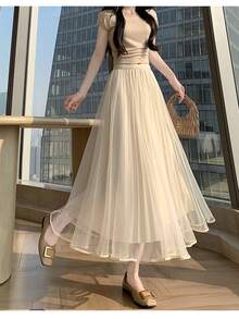 Chân váy midi bồng bềnh bằng vải tuyn mới dành cho nữ, thích hợp cho mùa xuân/hè. - Màu be - Xem 4