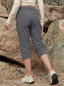 Cavva 女士七分防水裤，透气速干，轻便柔软，中腰设计，弹性裤脚，可调节裤脚开口，5个安全口袋，适合徒步、露营和休闲穿着。 - 深灰色 - 查看 4