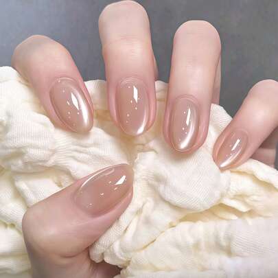 ¡Mejora tu aspecto al instante! Estos adhesivos de uñas de cristal nude en forma de ojo de gato ovalado corto se ajustan perfectamente. El set incluye 1 pieza de gel de gelatina y 1 lima de uñas, adecuado para damas y niñas para uso diario, estudio y fiesta. El gel de gelatina se envía al azar. Uñas postizas