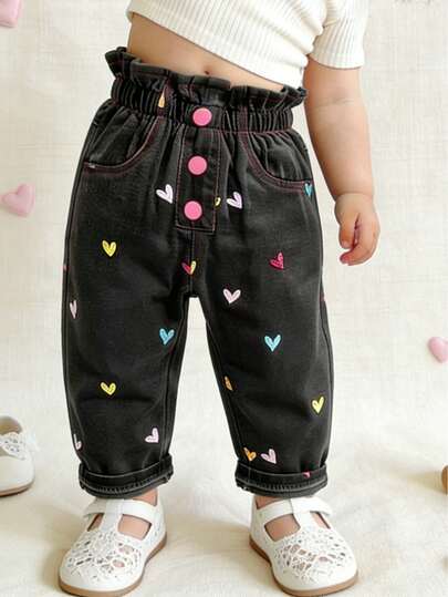 全新女婴不对称心形刺绣休闲日常穿着牛仔裤