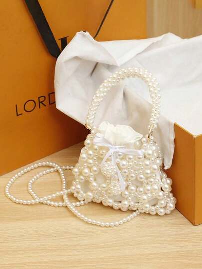 1. 新款迷你珍珠手提包，可爱独特，高品质PU斜挎包，带衬里，清新活泼的配色方案，青春靓丽的新风格，可斜挎，休闲时尚，或作为礼物送给朋友。