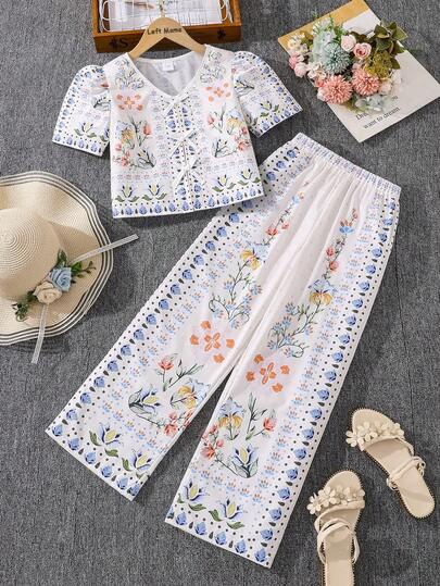 Left Mama Bộ đồ bé gái kiểu dáng thường ngày gồm áo tay ngắn và quần ống đứng in họa tiết hoa, thích hợp cho mùa hè.