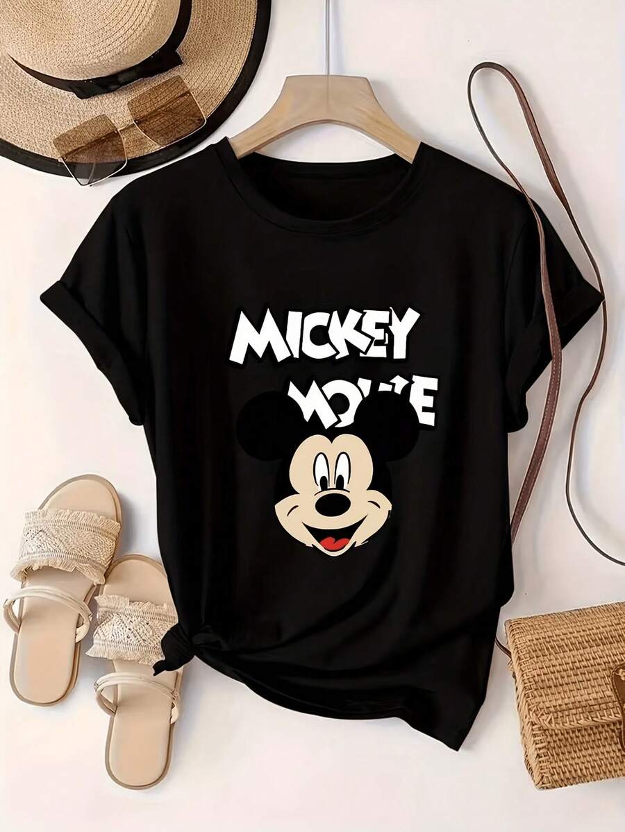 Women's Black Cotton Short Sleeve T-Shirt With Iconic White "MICKEY MOUSE" Logo And Mickey Head Print, Summer Vacation Styling Ideas With Straw Hat, Sunglasses, Sandals And Tote Bag, Disney Shirts, Summer Outfits For Women, Spring Outfits For Women, Officially Licensed Disney T-Shirts, Disney Men's And Women's Spring/Summer Fashion Casual Short-Sleeve T-Shirts - Black - View 1