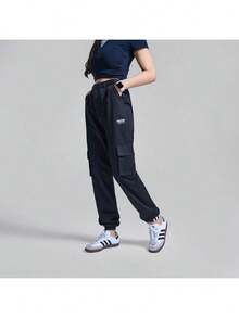Adidas Originals 女式长裤 2026 春季新款时尚运动休闲锥形裤腿工装裤复古口袋慢跑裤 GD3071 - 黑色 - 查看 1