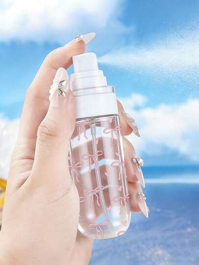 Botella de spray recargable con forma de corazón y lazo rosa - Botella de rociador portátil y reutilizable para aceites esenciales, perfumes y cuidado de la piel, adecuada para salones de belleza, cocina, baño, jardín, viajes y negocios, regalo del Día de la Madre, esencial para viajar