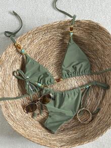 Bộ bikini màu xanh ô liu đính hạt cườm - Áo tam giác thanh lịch và quần buộc dây bên hông với điểm nhấn ngọc trai | Hoàn hảo cho kỳ nghỉ biển và những chuyến đi nghỉ mát mùa hè ở vùng nhiệt đới - màu xanh lá - Xem 7