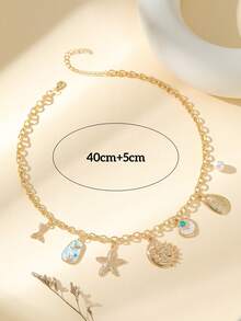 Collier charm or océan pour femme - Chaîne plaquée or avec pendentifs étoile de mer, coquillage, perle et soleil/lune céleste - Bijou de plage et vacances d'été - Multicolore - Voir 5