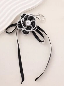 1 chiếc móc khóa trang trí túi xách hình hoa trà bằng vải giả ngọc trai, tua rua, thanh lịch, phù hợp cho nữ giới mặc hàng ngày và dự tiệc. Sản phẩm thủ công nên có thể có một vài khác biệt nhỏ về hình dáng. - màu đen - Xem 7