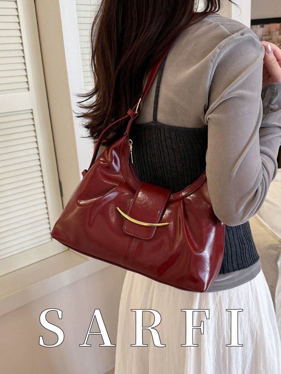 这款时尚高端的酒红色女士手提包非常适合夏季使用。它采用现代设计，搭配优质金属配件，独特的褶皱设计和可调节肩带更添时尚感。无论是购物、旅行还是日常使用，它都是您的理想之选。顺滑的金属拉链更添精致细节。这款女士单肩包采用耐用、耐磨、防水的PU材质，是购物、约会、通勤、摄影或度假的绝佳礼物之选。