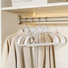 Móc treo quần áo bằng nhựa chịu lực cao, trọng lượng 25 pound (khoảng 11 kg), móc xoay, thích hợp cho áo khoác vai rộng và quần áo mùa đông dày (màu trắng). - Xem 9