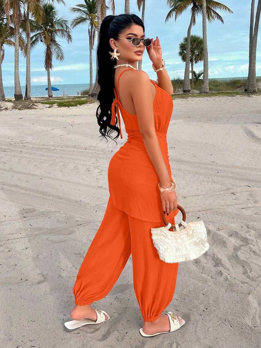 AIJ Mono naranja calabaza para mujer, diseño de tirantes finos sin mangas con detalle de nudo único y bolsillos. Un elegante mono de tela tejida larga para un look elegante de verano - naranja - Ver 1