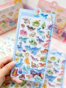 Những miếng dán khủng long 3D nổi này có kết cấu ba chiều độc đáo, phồng lên và có nhiều hình dạng khủng long khác nhau, bao gồm cả Tyrannosaurus và Brachiosaurus! Chúng lấp lánh với những chi tiết trang trí đầy màu sắc như đá quý, không thấm nước và chống mài mòn mà không để lại cặn keo, rất thích hợp cho sổ tay, đồ chơi và các dự án văn phòng phẩm tự làm của trẻ em, kết hợp giá trị giáo dục với vẻ dễ thương đáng yêu! - Nhiều màu - Xem 12