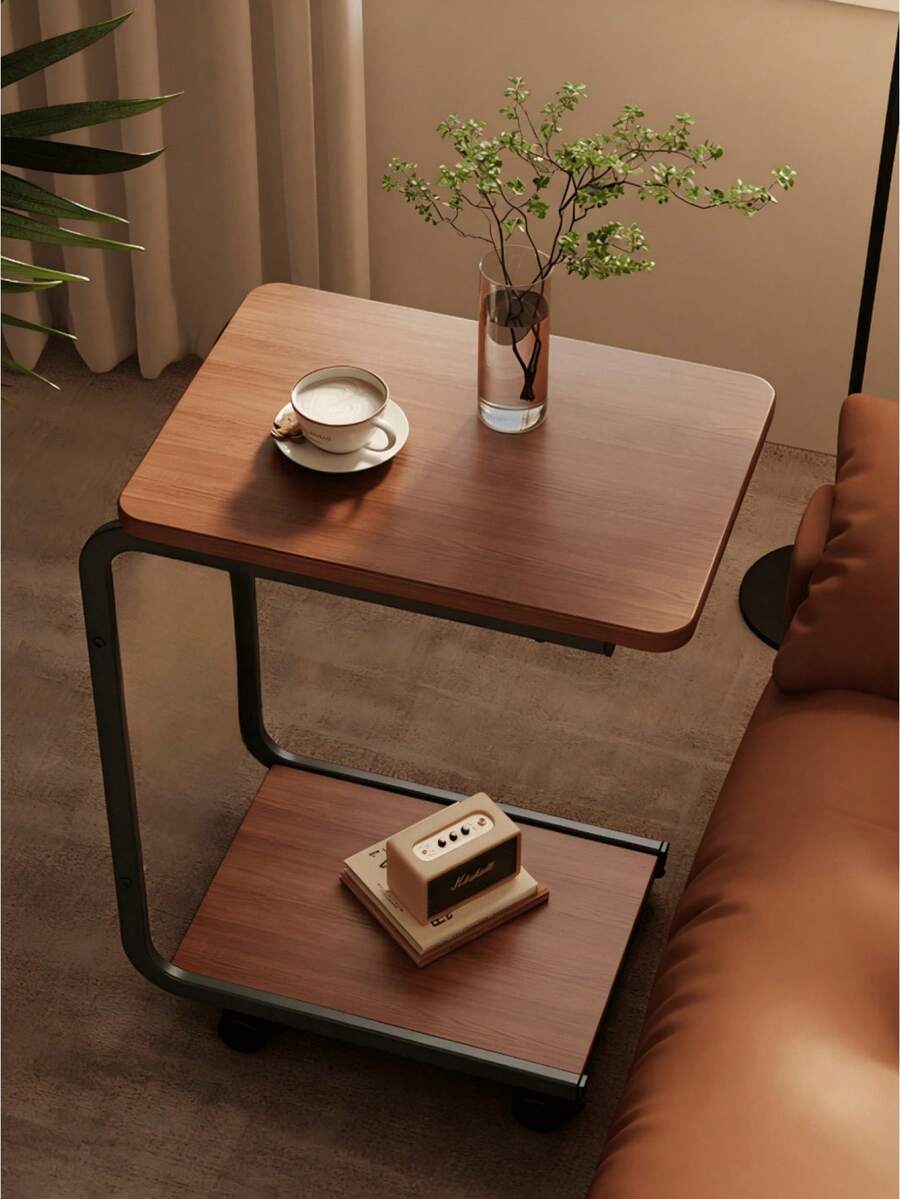 1 chiếc bàn phụ có bánh xe, khung kim loại và mặt bàn bằng gỗ. Có thể dùng làm bàn cà phê hoặc bàn phụ bên cạnh ghế sofa. Dễ lau chùi, di động, chắc chắn và bền. Thích hợp đặt cạnh ghế sofa, trong phòng ngủ, và có thể sử dụng trong nhà/ngoài trời. Cũng có thể dùng làm quà tặng ngày lễ hoặc vật trang trí phòng khách. - Nhiều thông số kỹ thuật - Xem 1