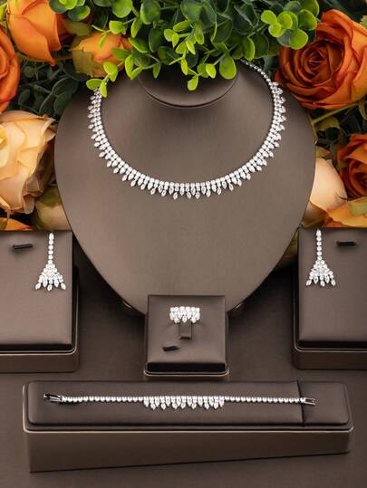 1 Set de joyería de diseño de ojo de caballo de circonita cúbica de lujo, incluye 1 par de aretes, 1 collar, 1 pulsera, 1 anillo, adecuado para uso en fiestas y banquetes de mujeres, sin incluir caja de regalo