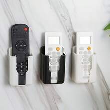 1个壁挂式遥控器收纳架 - 耐用塑料材质，适用于电视和空调遥控器；可壁挂或桌面安装，用作手机充电支架；多功能塑料收纳架，适用于电视、空调和办公用品；表面抛光处理；节省空间；易于安装 - 彩色 - 查看 6