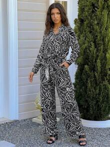 Bộ đồ 2 mảnh ZIAI dành cho nữ, áo thun dài tay cổ chữ V tay rớt vai in họa tiết lá cây và quần cạp chun, bộ đồ thun đi nghỉ mát mùa thu/đông. - màu đen - Xem 1