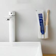 1个壁挂式遥控器收纳架 - 耐用塑料材质，适用于电视和空调遥控器；可壁挂或桌面安装，用作手机充电支架；多功能塑料收纳架，适用于电视、空调和办公用品；表面抛光处理；节省空间；易于安装 - 彩色 - 查看 5