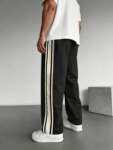 1 chiếc quần jogger nam cỡ lớn, dáng rộng, thoải mái, thích hợp cho chạy bộ, tập thể dục, hoạt động ngoài trời, leo núi, đi làm, đa năng và có họa tiết kẻ sọc. - màu đen - Xem 2