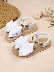 Große Größen 1 Paar weiße Sandalen für Mädchen mit dicker Sohle, weiches Materialmit großer Schleife, Gummizug-Schlupf, einfache gelbe Blumen Verzierung, klassisches Rundkopf-Design mit elastischer, weicher Sohle, modische und süße Sandalen mit dicker Sohle, geeignet für Mädchen von 3-15 Jahren für Alltag, Lässig, Party, Reisen, Frühling/Sommer Neuheit - Weiss - Übersicht 1