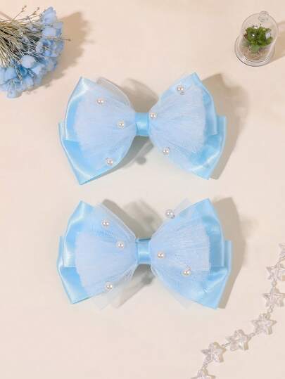 2个蓝色网纱蝴蝶结发夹，闪亮珍珠装饰，精致鳄鱼夹，优雅简约，适合日常、婚礼、派对、度假、节日等场合，是送给青少年的理想发饰。