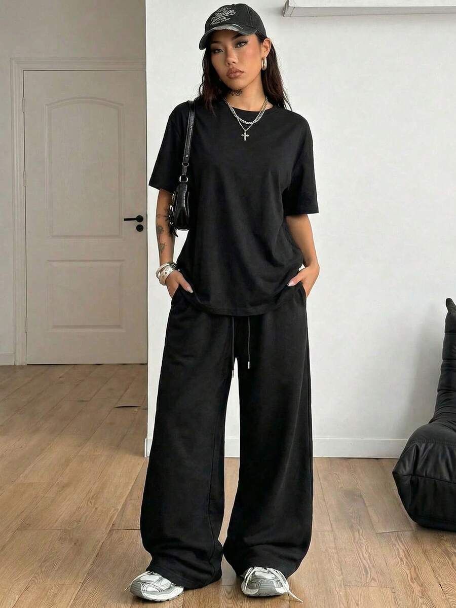 LQTY Spring/Summer 2-Piece Women's Casual Sporty Black Crew Neck T-Shirt With Drawstring Loose-Fitting Sweatpants. A Simple Street-Style Elegant - Black - View 1