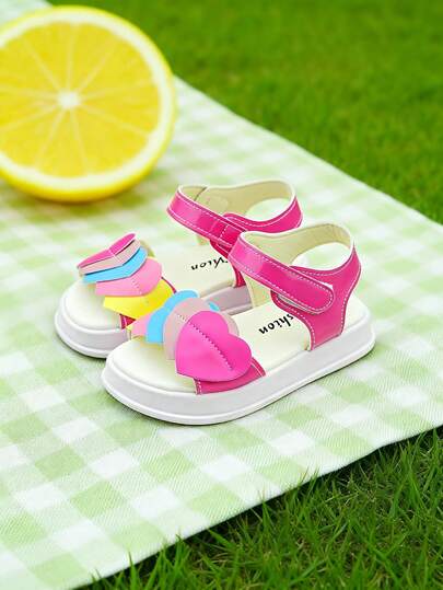 New Arrival - 3-12 Years Old Girls' Sweet Style Sandals. Matte Rose Red PU Sole Paired With 5-Color Heart-Shaped Layered Decor. Strap Hook And Loop Closure + Soft & Thick Sole. Open Toe Round Toe Shape. Sweet & Youthful Casual Style. Suitable For Daily School/Outing/Family Gathering. Perfect For Spring/Summer Season!