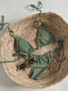Bộ bikini màu xanh ô liu đính hạt cườm - Áo tam giác thanh lịch và quần buộc dây bên hông với điểm nhấn ngọc trai | Hoàn hảo cho kỳ nghỉ biển và những chuyến đi nghỉ mát mùa hè ở vùng nhiệt đới - màu xanh lá - Xem 3