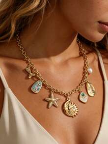 Collier charm or océan pour femme - Chaîne plaquée or avec pendentifs étoile de mer, coquillage, perle et soleil/lune céleste - Bijou de plage et vacances d'été - Multicolore - Voir 2