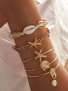 Conjunto de 5 pulseiras douradas com pingente de estrela-do-mar, concha e pérola em corrente metálica. Perfeitas para o dia a dia, encontros, férias, casamentos, feriados, aniversários, Dia das Mães e Dia dos Namorados. - Ouro - Ver 1