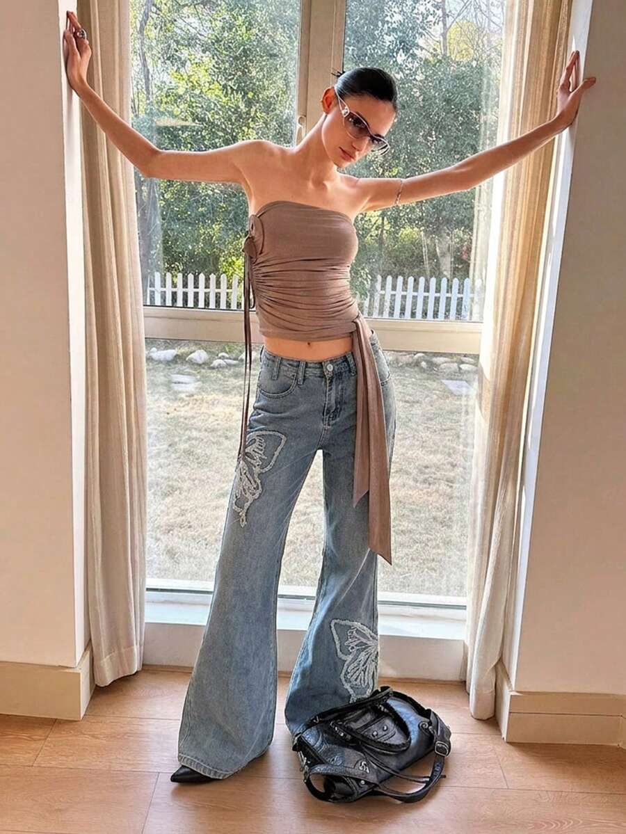 Jeans évasés à taille élastique avec patch papillon et ourlet effiloché, style western cowgirl pour femmes