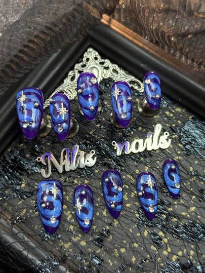 10pcs Almond Nail Acrylic Kit, Royal Blue Nails, Royal Blue Tie Dye, Hand Drawn Blue Rotating Asymmetric Wave Texture, Smooth Lines With A Sense Of Blending, With A Casual Cool Feeling, 3D Silver Beads&Eight Pointed Stars And Other Nail Accessories, Echoing The Night Sky&Starlight Theme, The Overall Style Tends To Be Cyberpunk Style, With Cool Tones