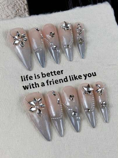 10片装高端温柔气质风格手绘渐变猫眼美甲贴片，镶嵌闪耀钻石，适合出席重要宴会、商务派对、家庭聚会和生日舞会等场合。